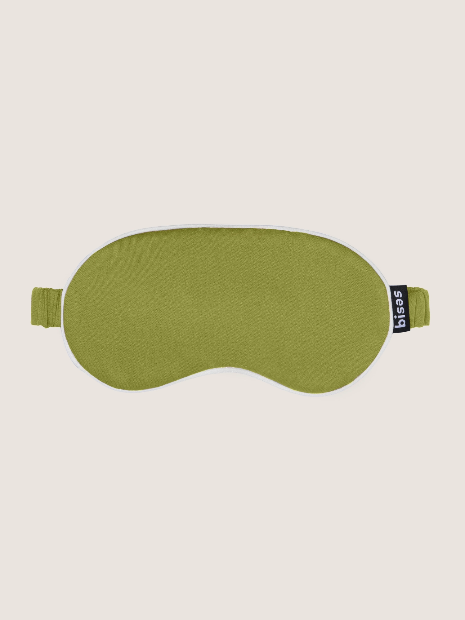 Сатинова маска для сну Bises Dreamline у відтінку Pistachio Green з молочним кантом і брендовою біркою, вигляд спереду